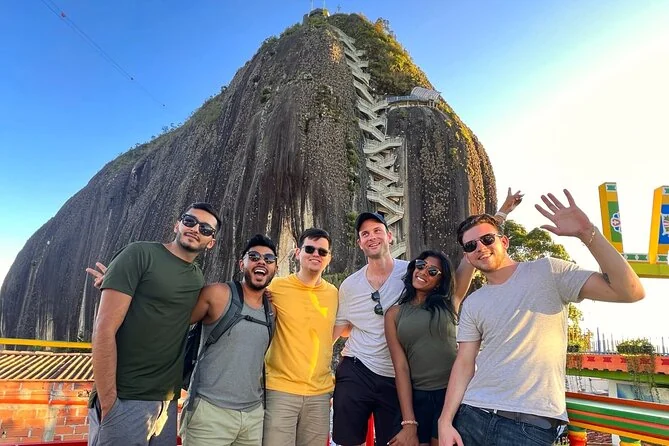 Travelers at El Peñol Rock during a Guatapé day tour from Medellín